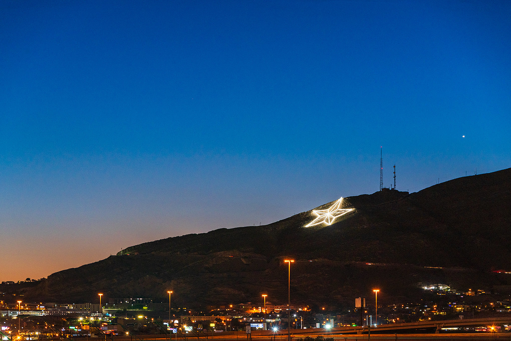 High Desert Tactical homepage hero — El Paso Star on the mountain